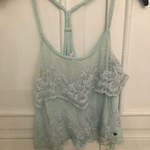 Light blue lace overlay crop top size XS.